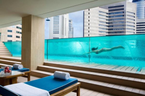 Отель Ascott Raffles Place Singapore  Сингапур